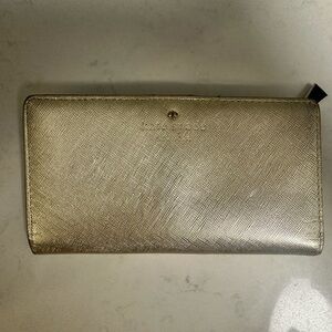 Kate Spade Madison Large Slim Bifold Wallet in Gold